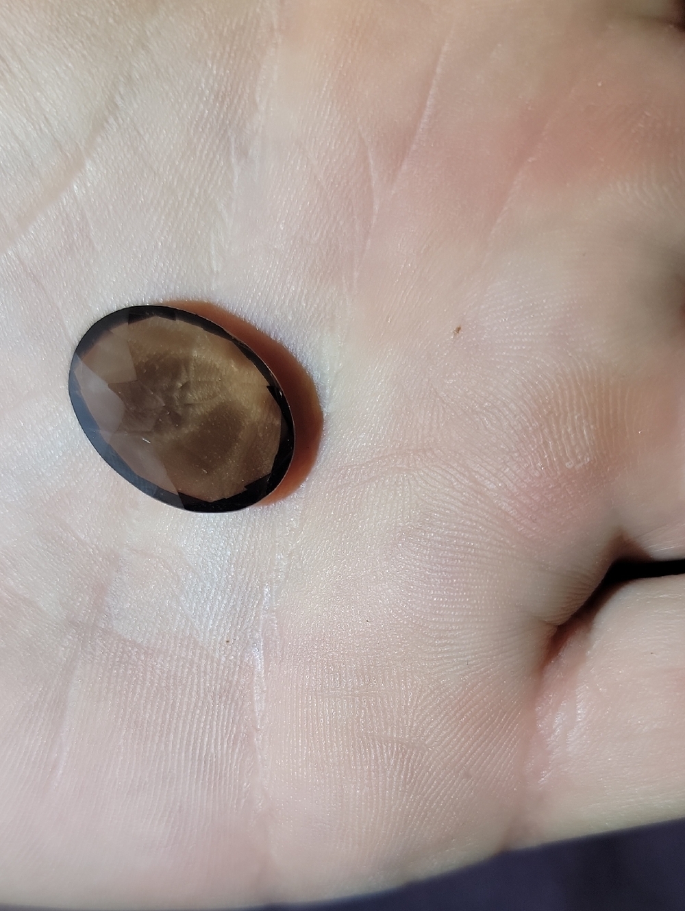 Faceted Smoky Brown Oval Gemstone